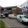 Vans outside an entrance to City Hall, Salisbury