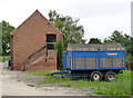 Red brick, blue truck