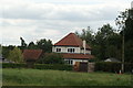 View of a house in Matching Green from the green #5