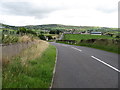 Moneyslane Road descending beyond Moneyslane Hill