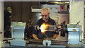 Master glass blower at work at the National Glass Centre, Sunderland