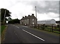 J2338 : Farmhouse at the junction of Dromara Road and High Road by Eric Jones