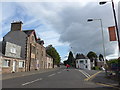 Postman crossing the A85