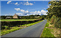 Huntingdon Hall Road passes Smithy Farm