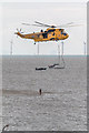 TM1714 : RNLI Volunteer leaving Sea King Helicopter, Clacton, Essex by Christine Matthews