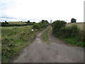 Private farm lane leading to outbuildings