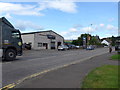 Looking across Burrell Road towards Strathearn Tyres