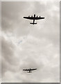 TF4480 : Two Avro Lancasters fly over Strubby Airfield by J.Hannan-Briggs