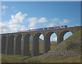 SD7579 : Passenger train crossing the Ribblehead Viaduct by Karl and Ali