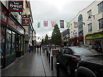 V9690 : Shops on Main Street, Killarney by Ian S