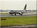 SJ8184 : British Airways Golden Dove at Manchester Airport by David Dixon