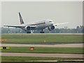 SJ8184 : Boeing 777 Landing at Manchester by David Dixon