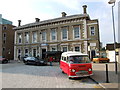 Classic Commer Camper Van outside Greenwich Station