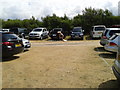 Parking in a field converted to a car park at Constantine Bay