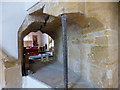 Looking through the squint on the north transept of Barrington church