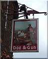 Sign for the Dog & Gun pub, East Butterwick