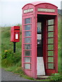 Crossapol: postbox № PA77 114 and phone box