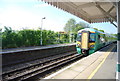 Southbound train pulling into Ockley Station