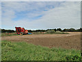 Farm implement in a field