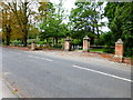 Gateway to narrow part of graveyard between road and railway