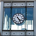 The Clock on the Courts Lift