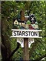 TM2384 : Starston Village sign by Geographer