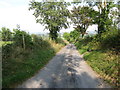 East Cloghoge Road descending northwestwards to the Cully Water Valley