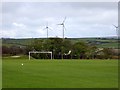 Delabole football ground and distant wind-turbines