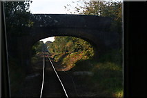 TG0940 : Approaching Holt: road bridge over North Norfolk Railway by Chris