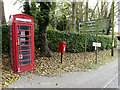TL7554 : Telephone Box, Wickham Street Postbox & Roadsign by Geographer