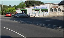 H9617 : Vivo Store and Donnelly's Bar at the western end of the bridge at Silverbridge by Eric Jones