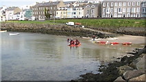 C8540 : Canoe lesson Portrush harbour by Willie Duffin