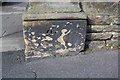 Benchmark on pier at #51 Bingley Road