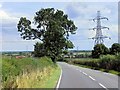 SK7455 : Power Lines Crossing the A617 near Micklebarrow Hill by David Dixon