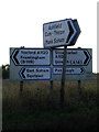 TM2161 : Roadsigns on the A1120 Main Road by Geographer