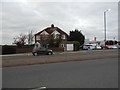 House and car dealership on the A30, Bedfont