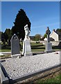 Madonna and Child over the Hearty Family Plot at the Creggan