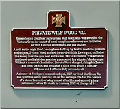 SJ8989 : Plaque to Private Wilf Wood V.C. by Gerald England