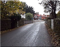SJ2837 : Minor road crosses above Chirk railway station by Jaggery