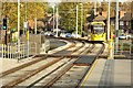 Tram Approaching Barlow Moor Road Metrolink Stop