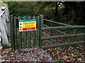 Bilingual danger signs on a bank of the Ewenny River, Pencoed