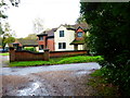 Junction at house of Brentmoor Road and footpath