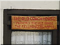 The Old Coach House sign