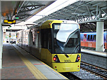 SJ8185 : Metrolink tram at The Station, Manchester Airport by Thomas Nugent