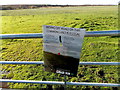 Illegal activity notice on an entrance gate to  Hirwaun Common near Heol-y-cyw