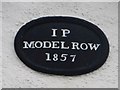 NY0230 : Inscribed stone, Model Row, Seaton by Graham Robson