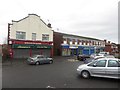 NY3855 : Suburban shops at the corner of Orton Road and Wigton Road by Graham Robson