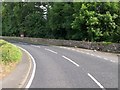 Sharp bend in the A50 at the entrance to Ballyward Lodge