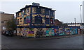 Graffiti-covered derelict pub in the centre of Gloucester