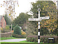 SJ5645 : Signpost in the centre of Marbury village by Stephen Craven